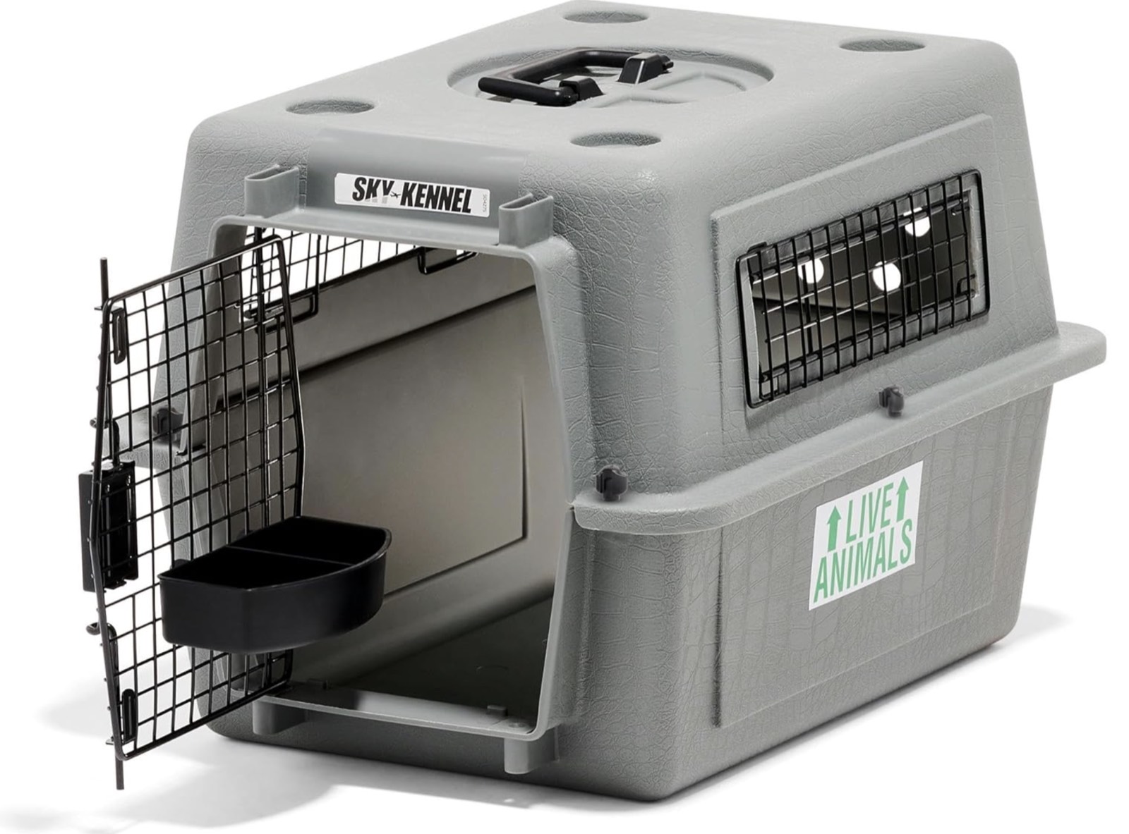 A Petmate Sky Kennel hard-sided travel crate with a metal door, IATA compliant for cargo.