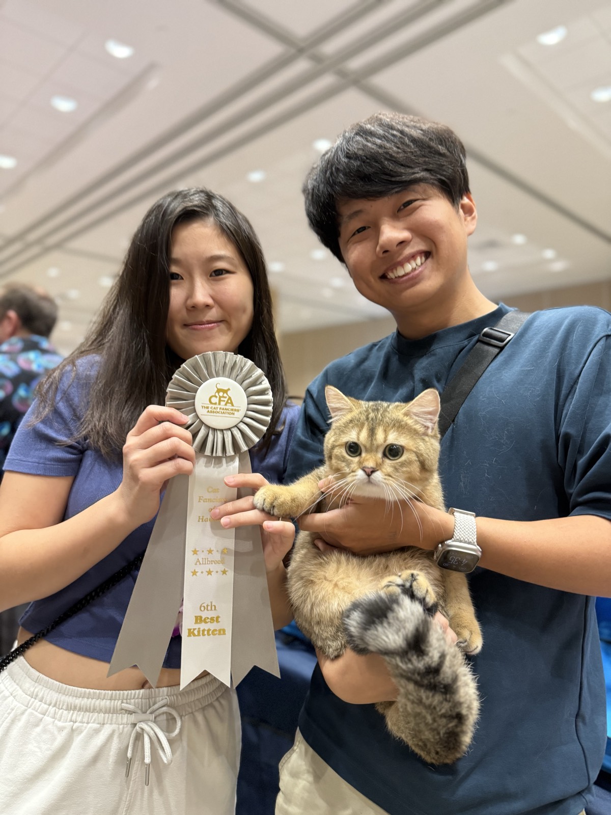 Boba with his ʻohana at a CFA cat show
