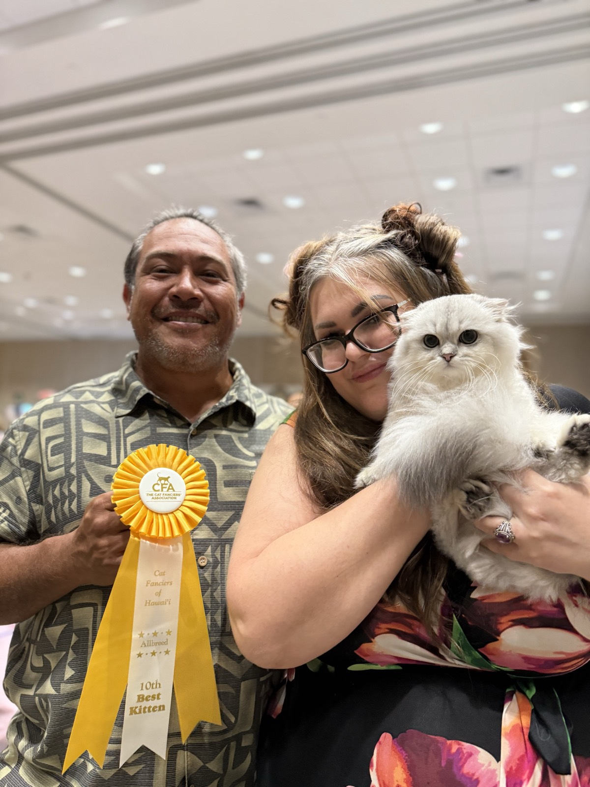 Bonnie with her ʻohana at a CFA cat show in Honolulu